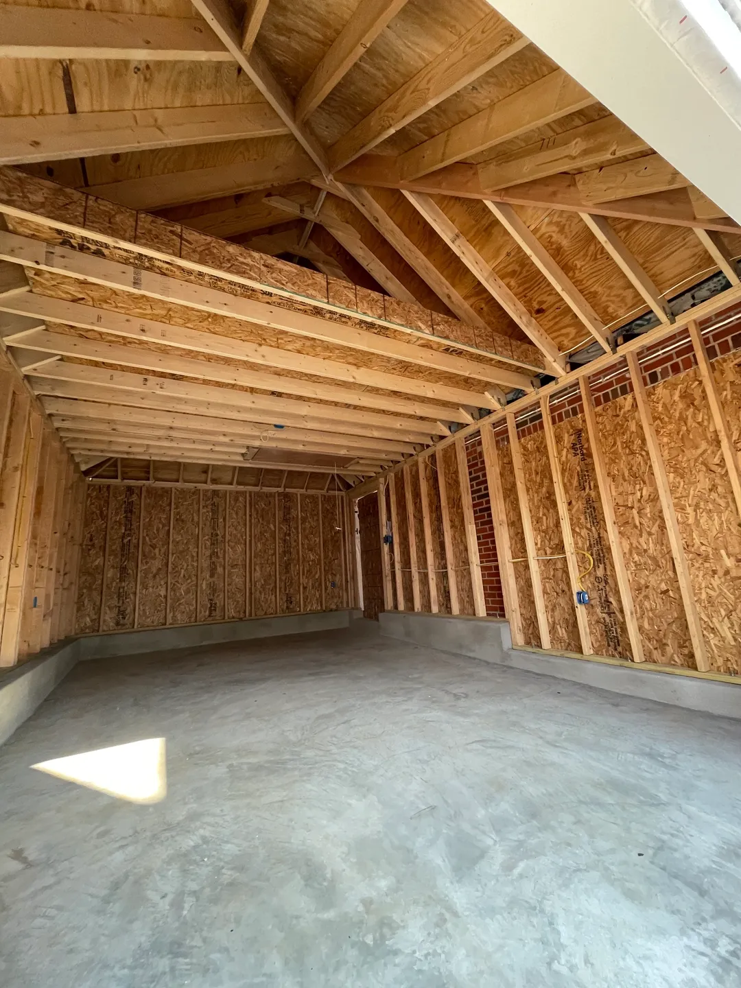 A room with many wooden walls and floors.